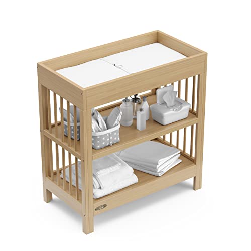 Graco Teddi Changing Table with Water-Resistant Changing Pad (Driftwood) - GREENGUARD Gold Certified, Includes Bonus Water-Resistant Changing Pad with Safety Strap, 2 Shelves, Easy-to-Match