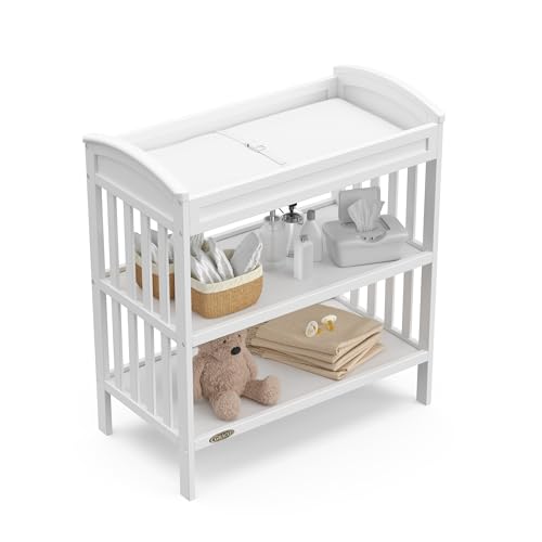 Graco Benton Changing Table with Bonus Water-Resistant Changing Pad (White) - GREENGUARD Gold Certified, Includes Diaper Change Pad with Safety Strap, 2 Open Storage Shelves for Organizing