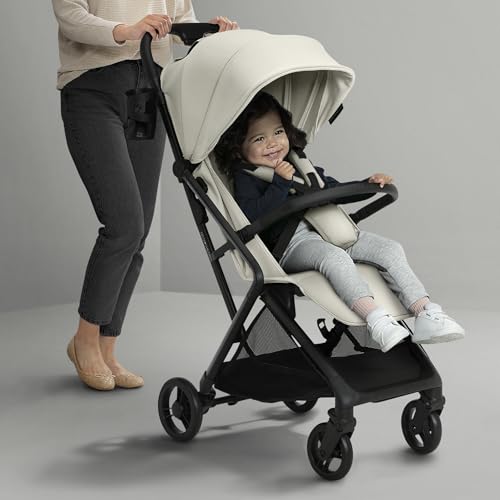 Delta Children Icon Ultra Compact Lightweight Everyday & Travel Stroller - One-Hand Fold - Only 15.6 Pounds - Fits in Overhead Compartments - Greenguard Gold Certified - Multi-Position Recline, Cream