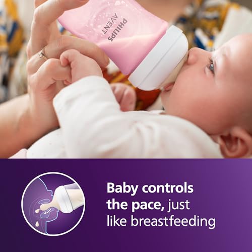 Philips Avent Natural Response Baby Gift Set - 3X 4oz Pink Bottles with Slow Flow Nipples (Flow 2), 1x 9oz Pink Bottle with Medium Flow Nipples (Flow 3), 2X Soothie Pacifiers 0-3m, SCD838/03