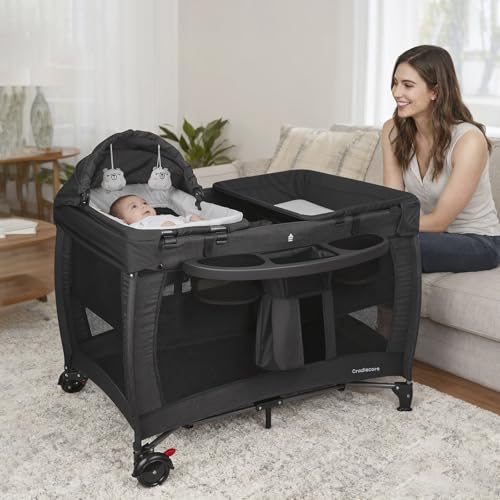 Cradlecare 5 in 1 Pack and Play with Bassinet & Changing Table, Portable Foldable Playpen for Babies and Toddlers with Locking Wheels & Diaper Storage, Easy Fold Travel Playard (Black)