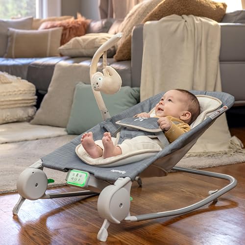 Ingenuity Gas Relief and Anti-Colic Baby Bouncer Seat and Rocker, Gentle Belly Massage to Relax and Soothe Bellies, Instant Tummy Soother, 20 Songs and Melodies – Parker