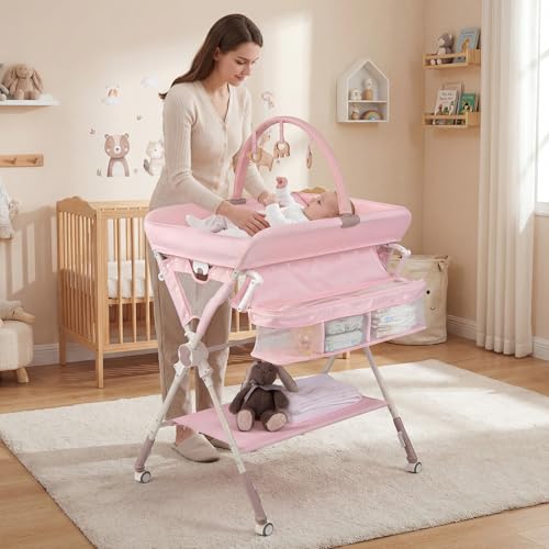 BABY JOY Portable Baby Changing Table, Foldable Diaper Changing Station with Wheels, Adjustable Height, Large Storage Rack, Removable Activity Arch, Mobile Nursery Organizer for Newborn Infant (Pink)