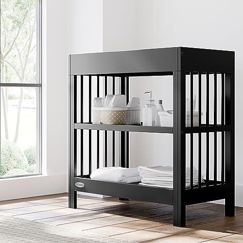 Graco Teddi Changing Table with Water-Resistant Changing Pad (Black) - GREENGUARD Gold Certified, Includes Bonus Water-Resistant Changing Pad with Safety Strap, 2 Shelves, Easy-to-Match