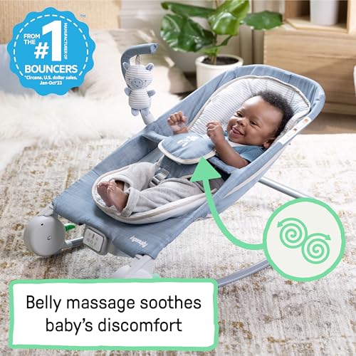 Ingenuity Gas Relief and Anti-Colic Baby Bouncer Seat and Rocker, Gentle Belly Massage to Relax and Soothe Bellies, Instant Tummy Soother, 20 Songs and Melodies – Chambray Blue
