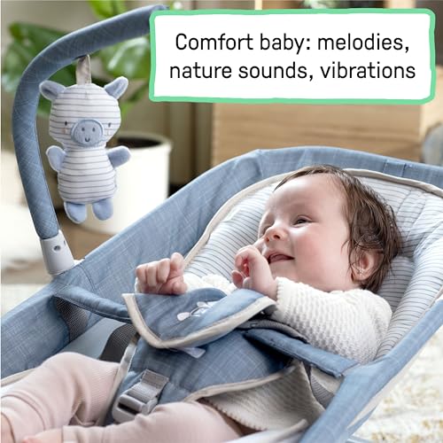 Ingenuity Gas Relief and Anti-Colic Baby Bouncer Seat and Rocker, Gentle Belly Massage to Relax and Soothe Bellies, Instant Tummy Soother, 20 Songs and Melodies – Chambray Blue