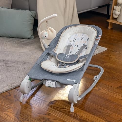 Ingenuity Gas Relief and Anti-Colic Baby Bouncer Seat and Rocker, Gentle Belly Massage to Relax and Soothe Bellies, Instant Tummy Soother, 20 Songs and Melodies – Parker