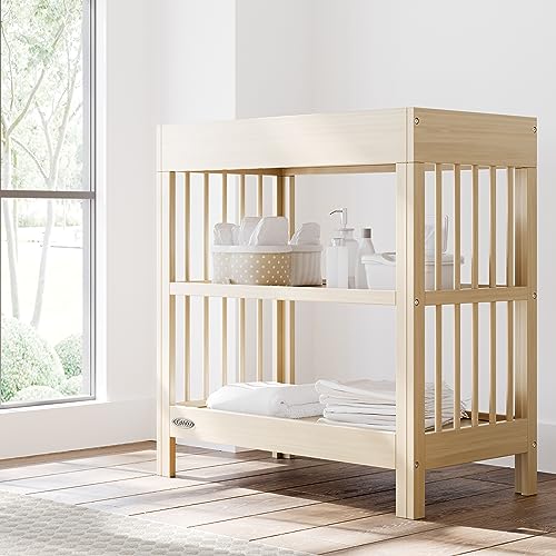 Graco Teddi Changing Table with Water-Resistant Changing Pad (Driftwood) - GREENGUARD Gold Certified, Includes Bonus Water-Resistant Changing Pad with Safety Strap, 2 Shelves, Easy-to-Match